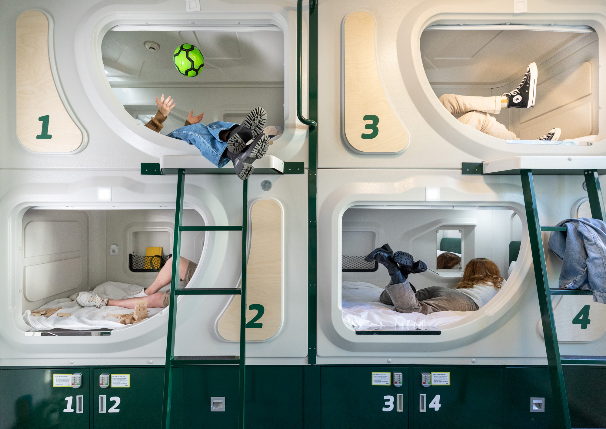 A pod room showing legs only in pods