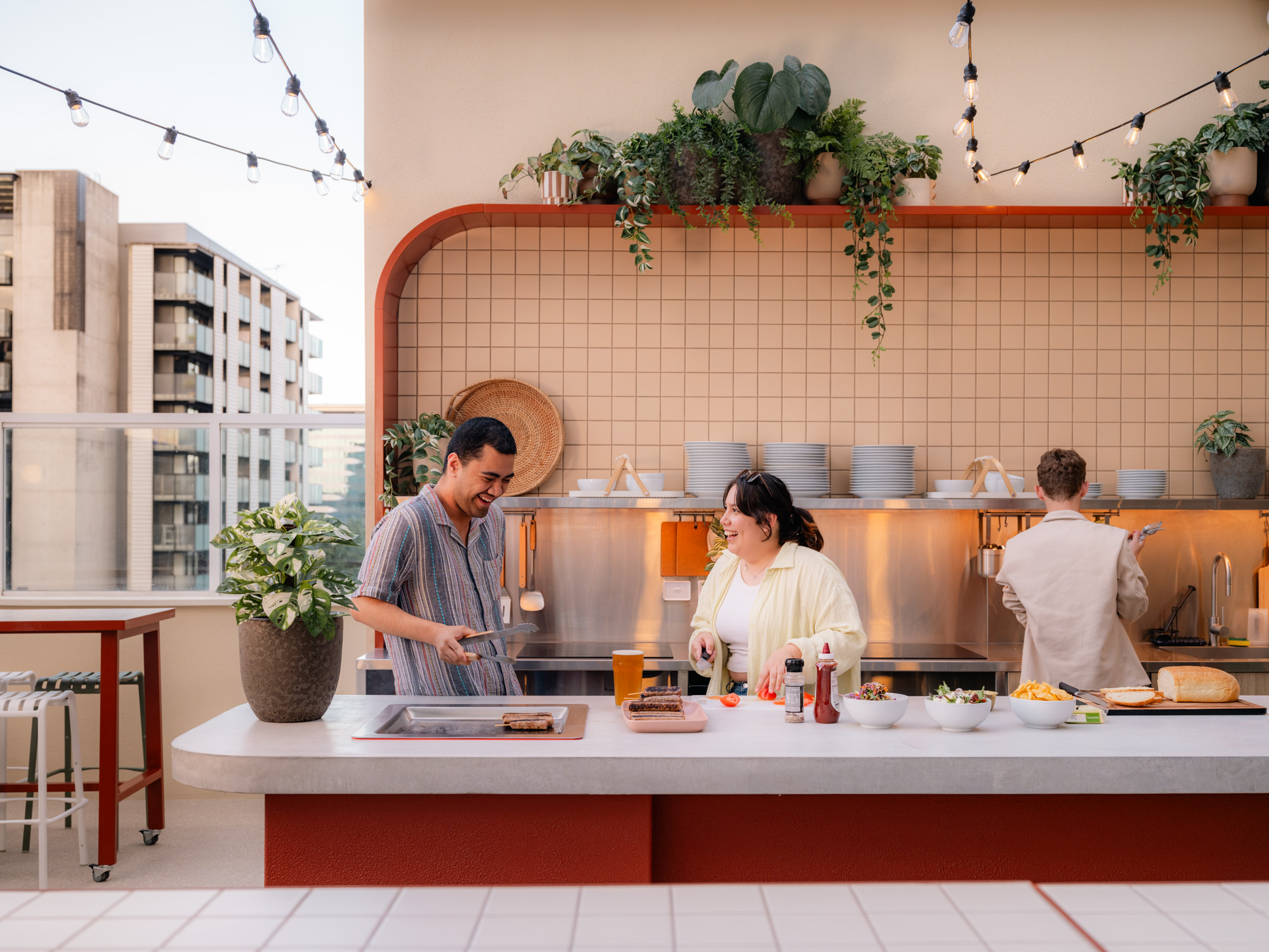 Cooking up a storm on the BBQ Level 4 LyLo Brisbane